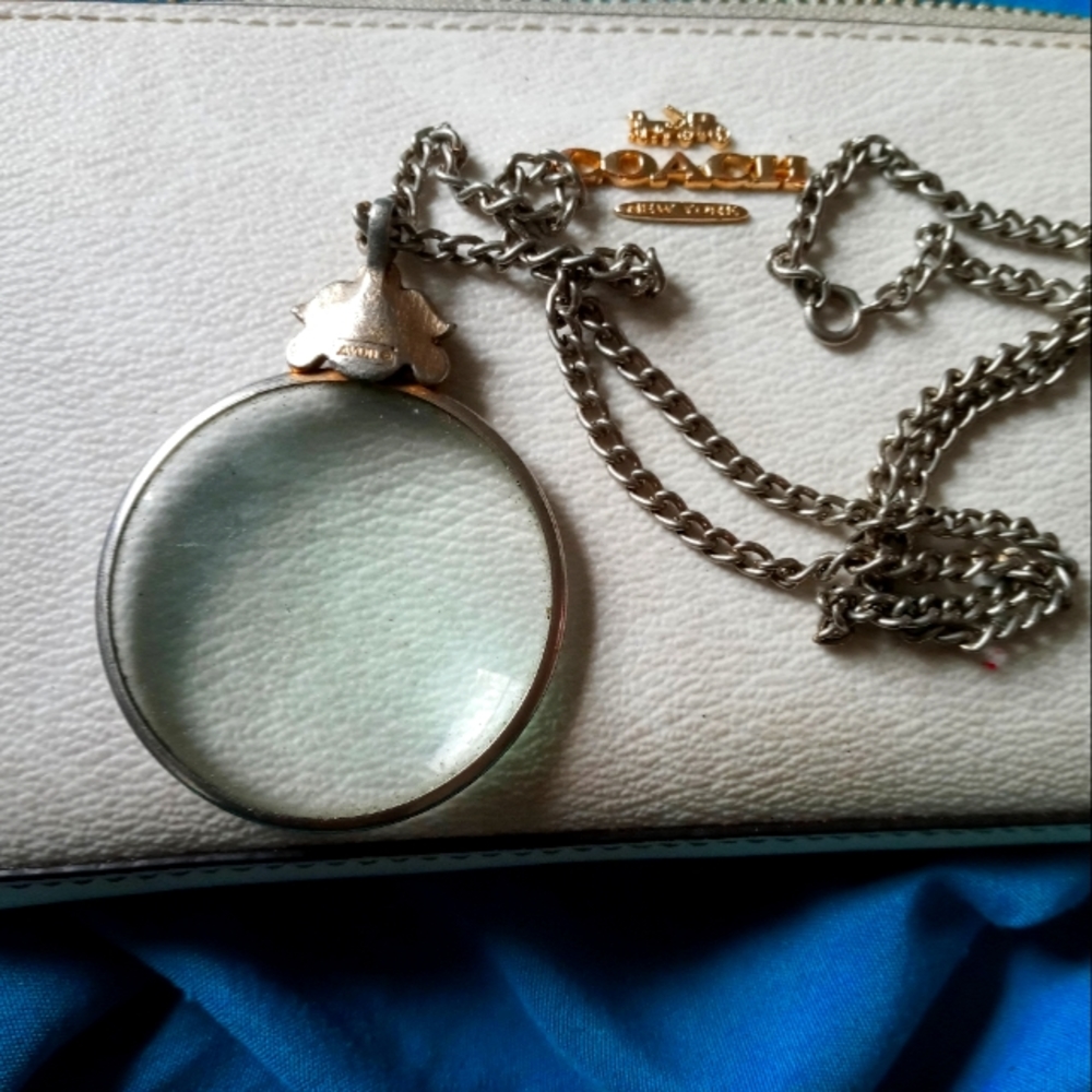 Vintage Avon magnifying glass necklace